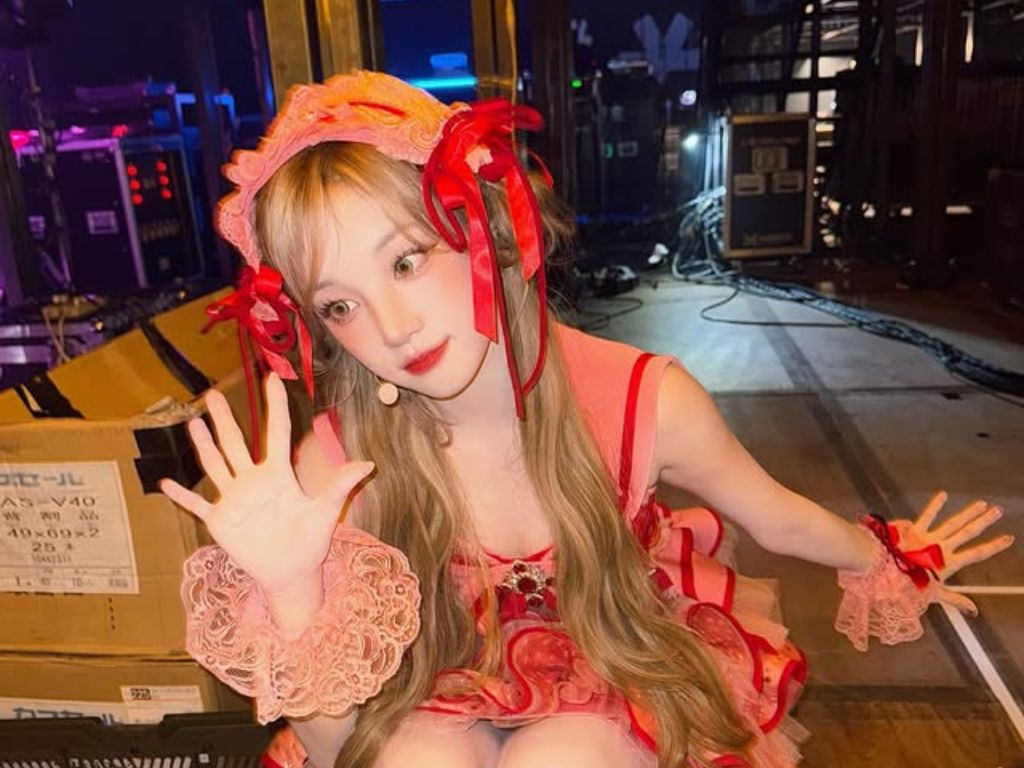 YUQI assures fans she is now paying attention to previous injury